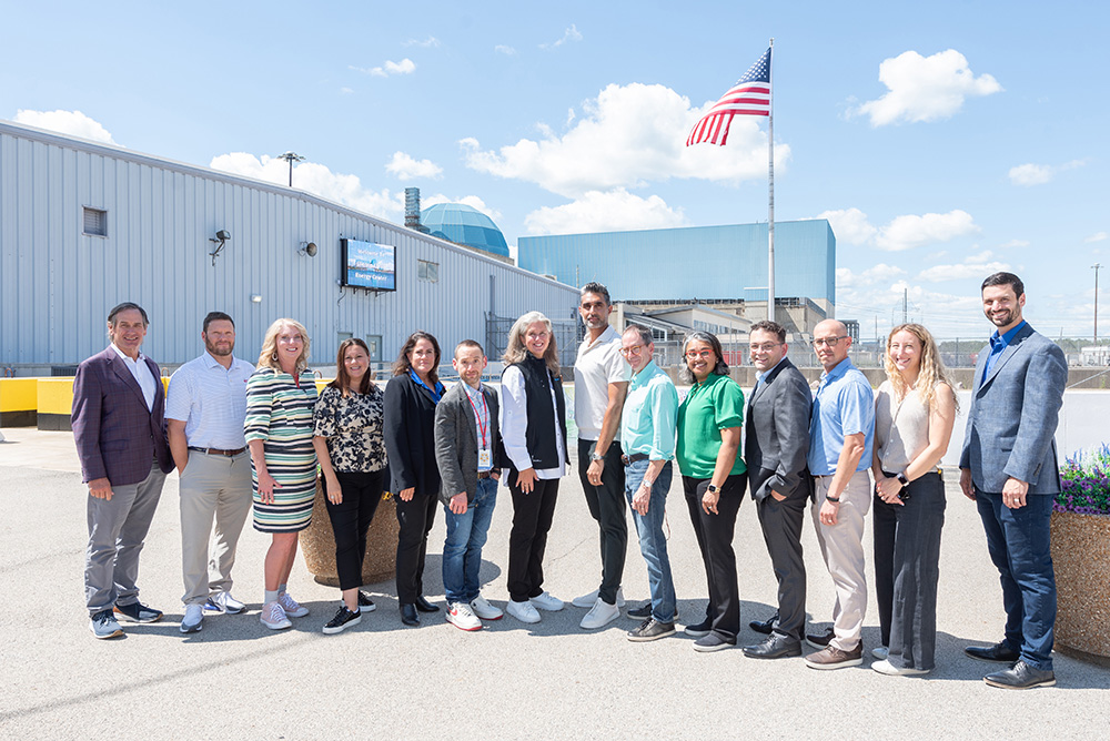 Group shot in front of Clinton Clean Energy Center