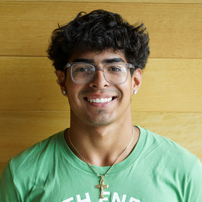 Student smiling at camera