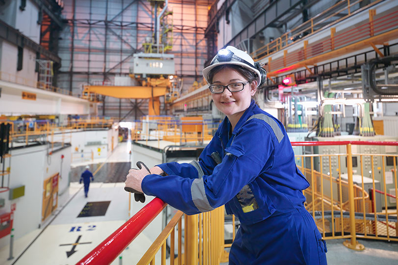 Women smiling in facility on cat walk