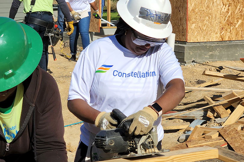 Women building housing